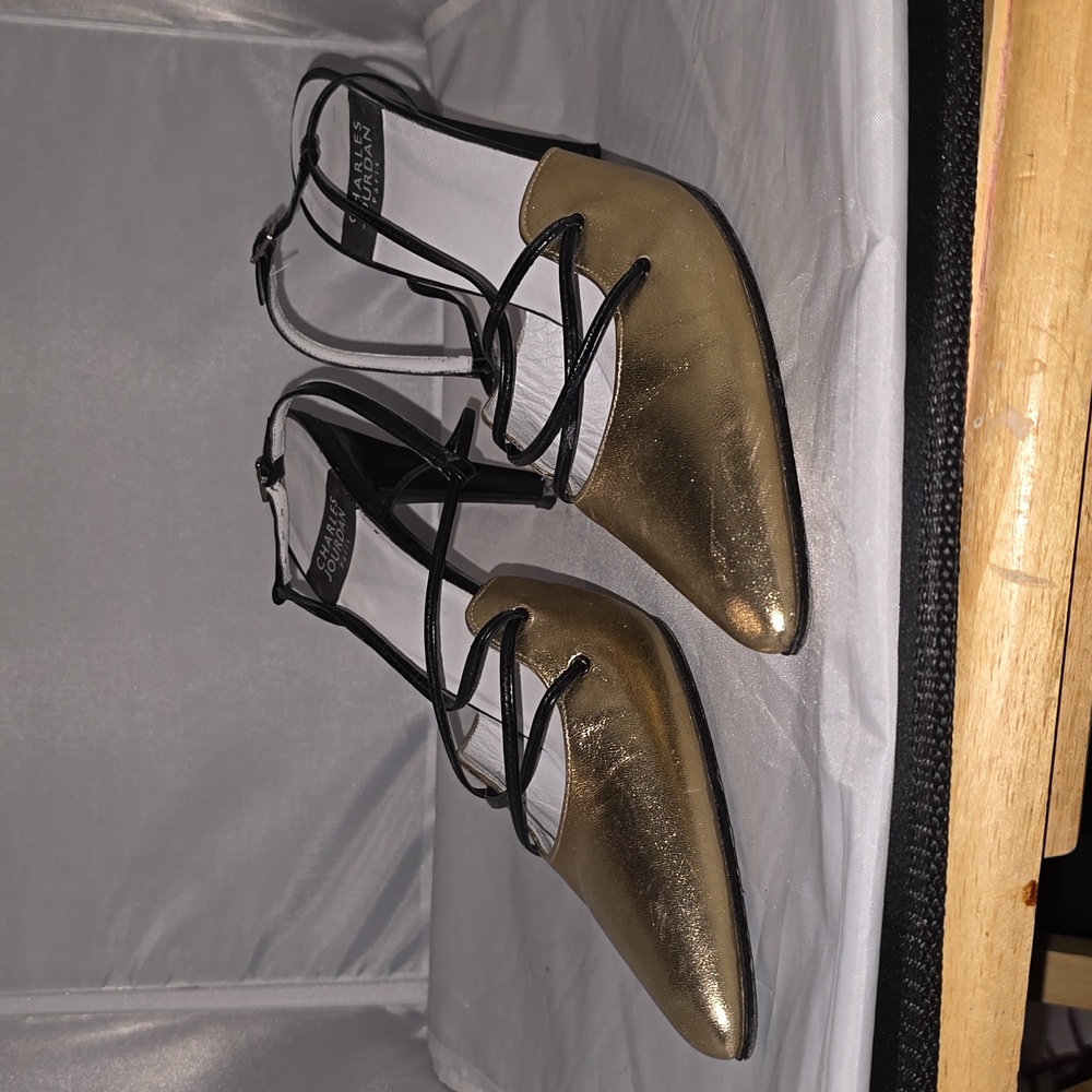 Charles Jourdan gold and black dress pumps